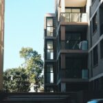Photograph of a nearly-complete apartment block in Sydney against a blue sky